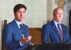 Prime Minister Justin Trudeau speaks with British Columbia Premier John Horgan